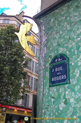 A pretty tiled wall for the rue des Rosiers street sign
